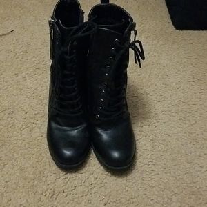 Black high heeled combat boots